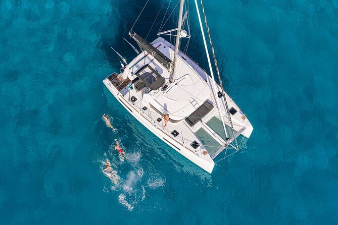 Catamaran Day & Sunset Cruises with meals Drinks and transportation - Sunset Cruising: Golden Hour Without the Land-Queue Stress