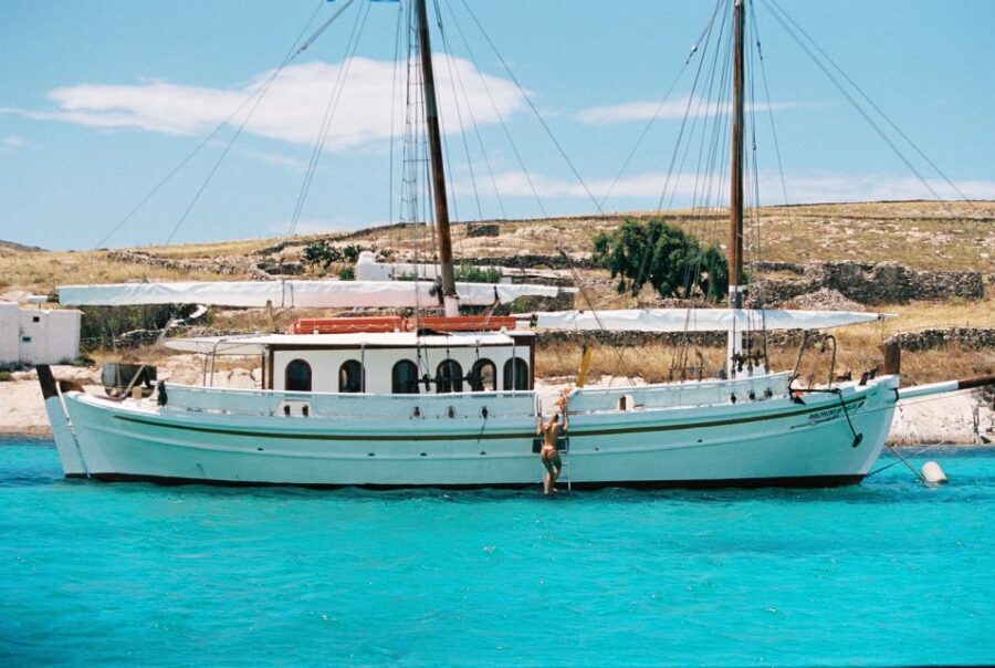 Corfu Town: Full-Day Cruise with Lunch, Drinks & Swim Stops - First water break near Nissaki: snorkeling time and cliffside calm
