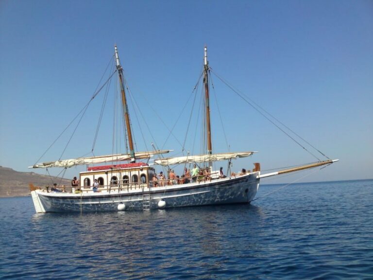 Corfu Town: Full-Day Cruise with Lunch, Drinks & Swim Stops - Getting started: Corfu Old Port and the wooden boat Koryfo