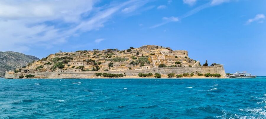 Crete: Day Trip to Agios Nikolaos and Spinalonga Island - Elounda: from fishing village feel to a proper coastal break