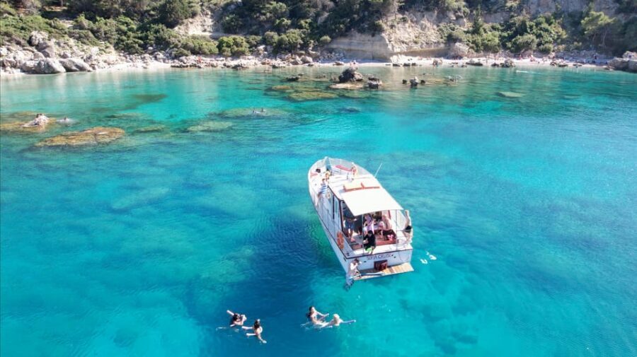 Faliraki: Boat Trip to Afantou Caves, Antony Quinn, Ladiko - On-Board Perks: Drinks, Fruits, Snorkel Gear, and Cocktails as an Add-On