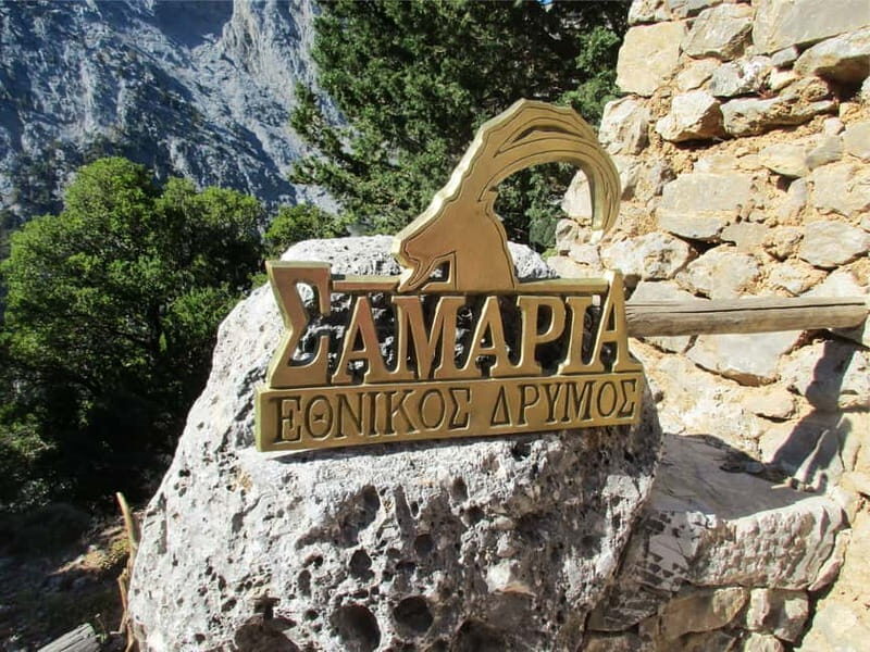 From Chania: Full-Day Samaria Gorge Trek Excursion & Guide - Samaria Gorge Entrance: Old Forest, Springs, and Rock Formations