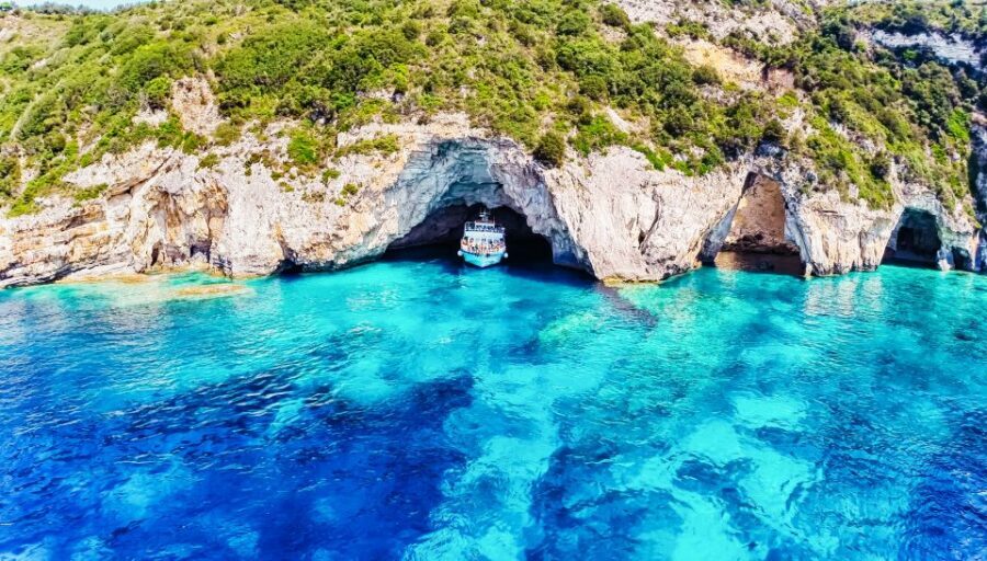 From Corfu: Day Cruise to Paxos, Antipaxos, and Blue Caves - The sailing scenery: Corfu old town views and constant Ionian Sea outlooks