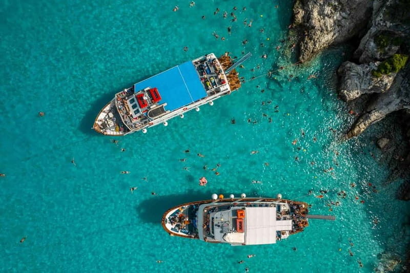 From Corfu: Day Cruise to Paxos, Antipaxos, & the Blue Caves - Guide vibe: facts, humor, and a later party mood