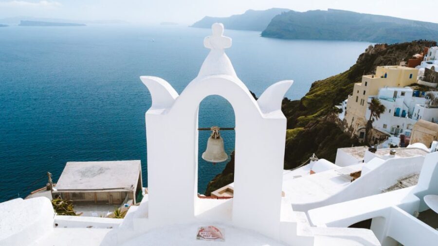From Heraklion/Crete: Santorini Island Guided Day Trip - Oia arrival: blue domes, sharp views, and crowded photo physics