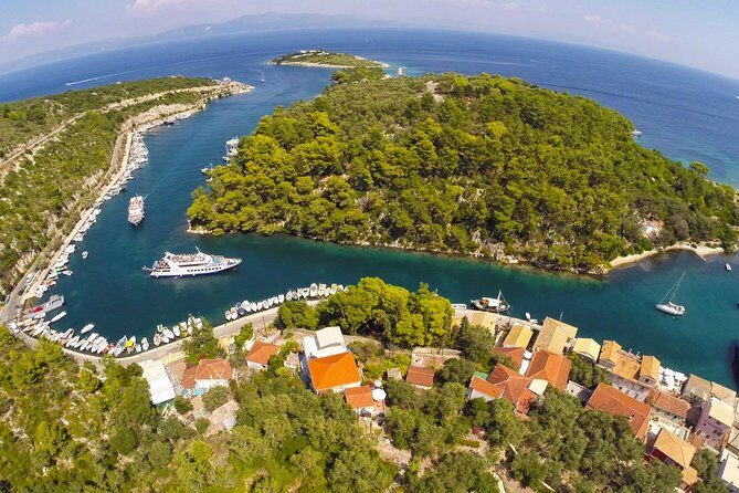 Full-Day Boat Tour of Paxos Antipaxos Blue Caves from Corfu - How Corfu Town, the fort, and Kanoni look from the boat