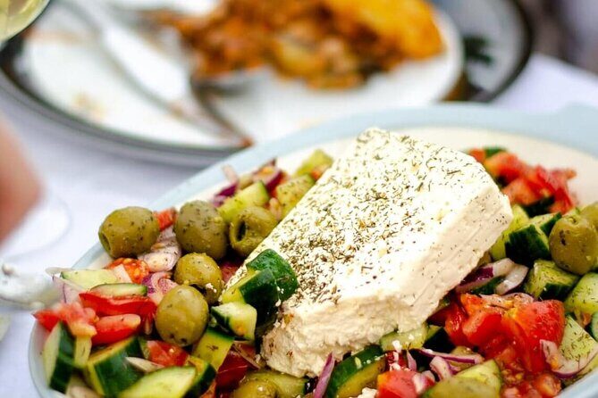 Greek Cuisine Cooking Class in Santorini with Recipes and Wine - What You Cook: Tzatziki, Greek Salad, Tomato Fritters, and Pasticio