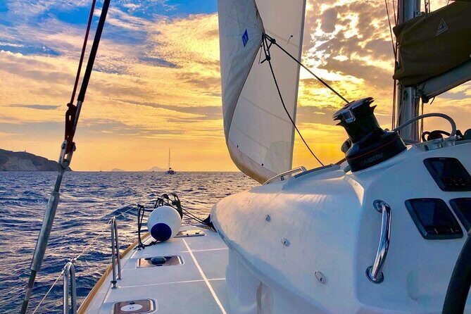 Half Day Premium Catamaran Cruise in Santorini including Oia - Onboard comfort: drinks flowing, crew energy, and towels