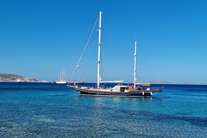 Mykonos Sail Cruise to Rhenia, Guided Tour of Delos, Lunch&Drinks - Delos With a Licensed Guide: Temples, Museum Artifacts, and Mt. Kynthos Views