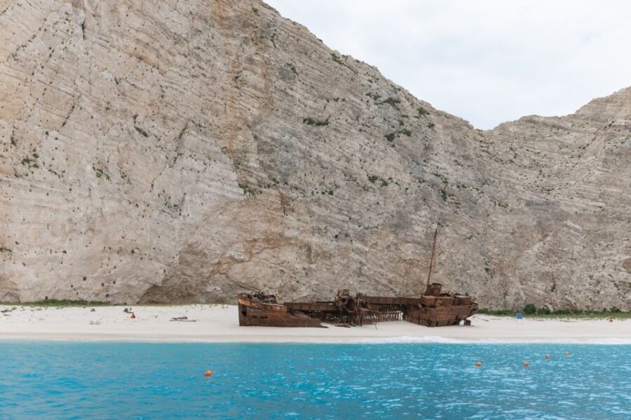 Porto Vromi: Shipwreck, Caves, & White Beach Swimming Cruise - Crew + skipper energy: why it affects the photos and the mood