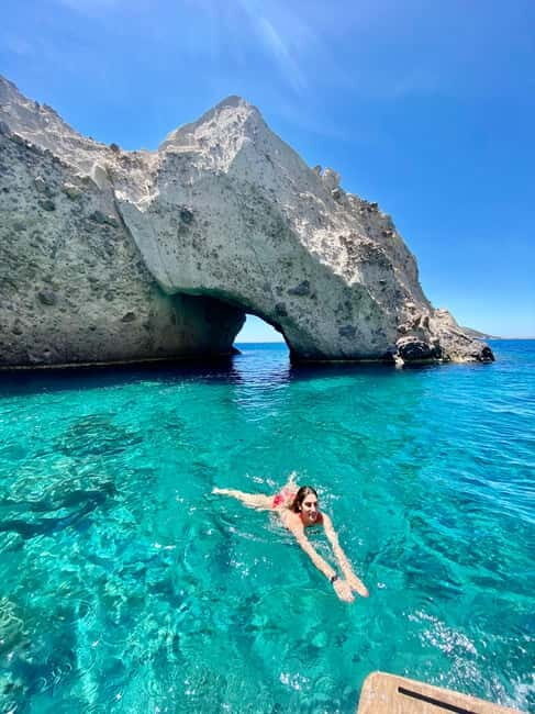 Pounta: Blue Lagoon Boat Tour - Final swim stop on a shallow rocky shore: jump, float, repeat