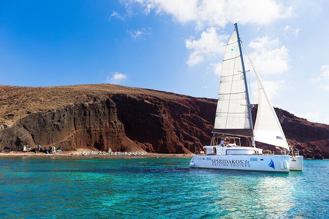 Premium Small-Group Catamaran Cruise with BBQ, Open Bar, Transfer - First time on a Santorini catamaran? Start in Vlichada