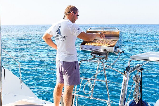 Premium Small-Group Catamaran Cruise with BBQ, Open Bar, Transfer - Palea Kameni hot springs: warm sulfur water with one big condition