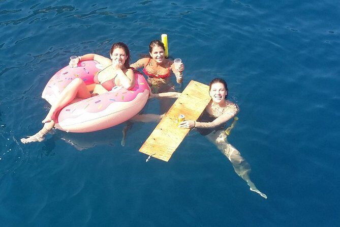 Rhodes Exclusive Swim Cruise Cocktail Open bar & Gourmet Buffet - Mandraki Harbour departure and the Rhodes sights from the water