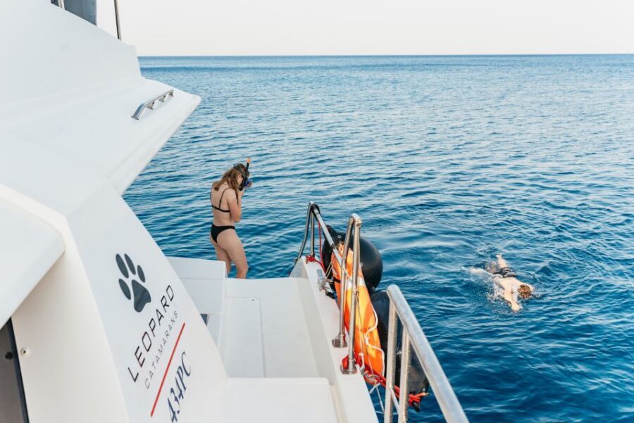 Rhodes: Sunset Catamaran Cruise with Dinner Buffet & Drinks - Dinner Buffet at Sea: Greek Favorites Plus Unlimited Wine, Beer, Soft Drinks