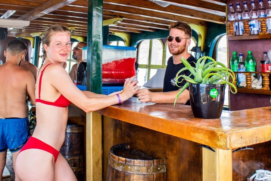 Rhodes: Sunset Cruise with Greek BBQ and Unlimited Drinks - Kallithea Springs swim stop: warm water, easy jumping, no rush