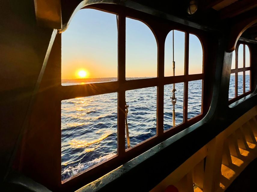 Rhodes: Sunset Cruise with Greek BBQ and Unlimited Drinks - The sunset segment back toward Rhodes Town: timing and where to sit
