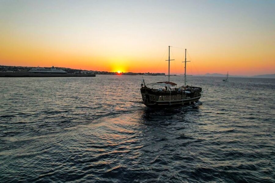 Rhodes: Sunset Cruise with Greek BBQ and Unlimited Drinks - The first sailing hour: Rhodes coastline views and getting comfy