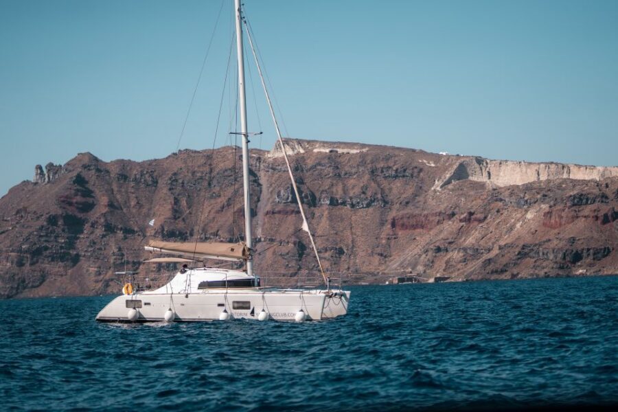 Santorini: Catamaran Caldera Cruise with Meal and Drinks - Meal and drinks onboard: Greek appetizers to BBQ, plus dessert
