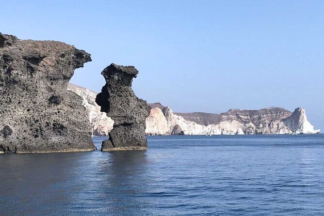 Santorini Catamaran Cruise with Greek Meal, Open-Bar and Sunset - Your 5-hour flow: volcano hot springs, Red Beach swim, and south-coast cruising