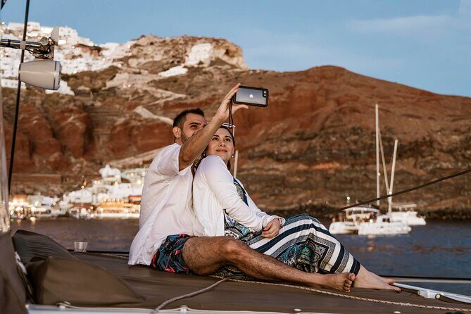 Santorini Catamaran Cruise with Greek Meal, Open-Bar and Sunset - Swimming and snorkeling: you can do as much or as little as you want