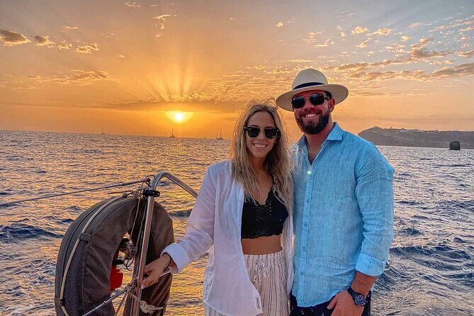 Santorini Catamaran Cruise with Greek Meal, Open-Bar and Sunset - Sunset cruise timing: what you get when you choose the evening option