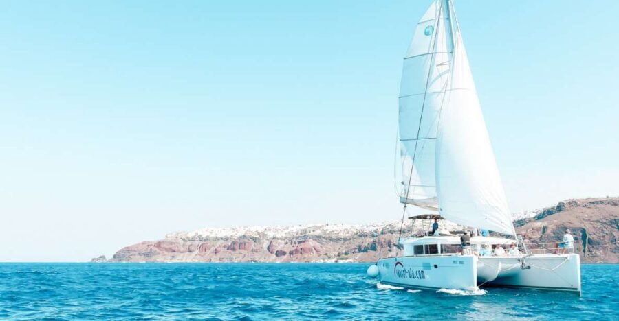Santorini: Catamaran Tour with BBQ Meal and Unlimited Drinks - Pickup and Getting to Ammoudi or Vlychada Without Stress