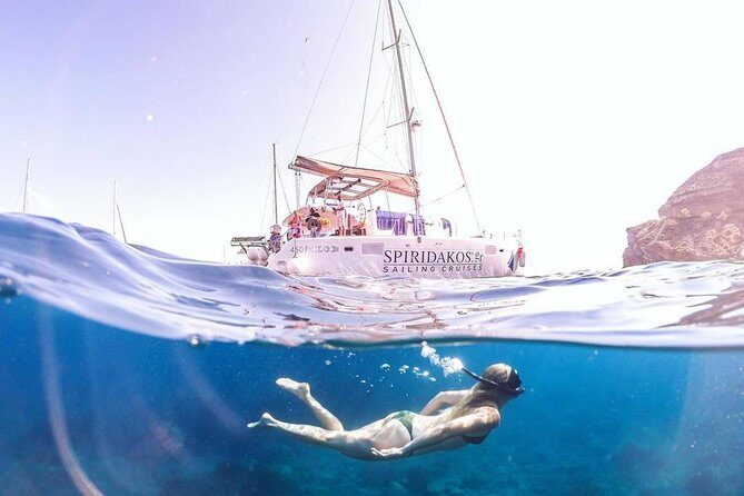 Santorini Classic Catamaran Cruise with BBQ, Drinks and Transfers - The best part: Mesa Pigadia swimming and snorkel time
