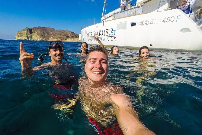 Santorini Classic Catamaran Cruise with BBQ, Drinks and Transfers - Hot springs at Palea Kameni: sulfur-water spa vibes (with a swim-in requirement)