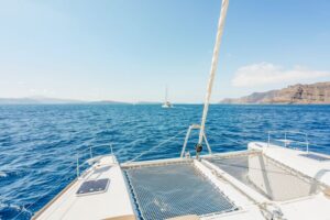Santorini: Luxury Catamaran Day Trip with Meal and Open Bar - Snorkel and Swim Stops: What You’ll Do in the Water