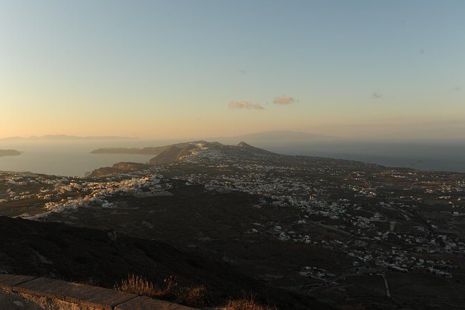 Santorini Luxury Custom Private Tour with Local guide - Oia first: caldera views, blue domes, and cobblestone wandering