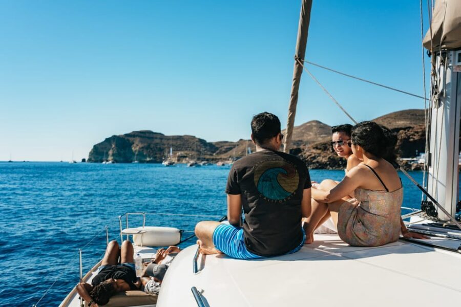 Santorini: Sailing Catamaran Cruise with BBQ and Drinks - Snorkeling stops: fun, but go in with the right expectations