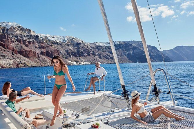 Santorini Sunset Luxury Sailing Catamaran Cruise with BBQ, drinks, transfer - Red Beach and White Beach: the real “vacation” part of the day
