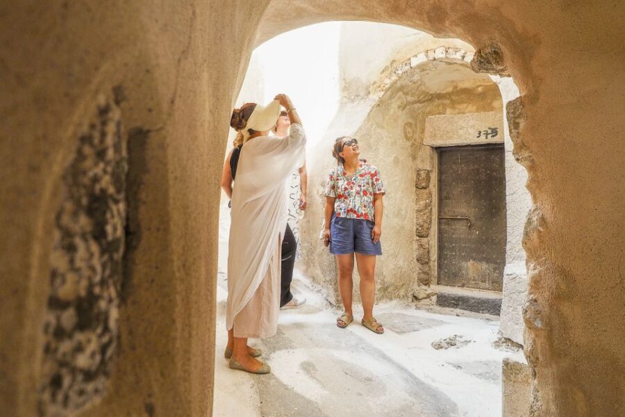 Santorini: Top Sights Day Trip, Wine Tasting, & Oia Sunset - Emporio and the Venetian fortress walk