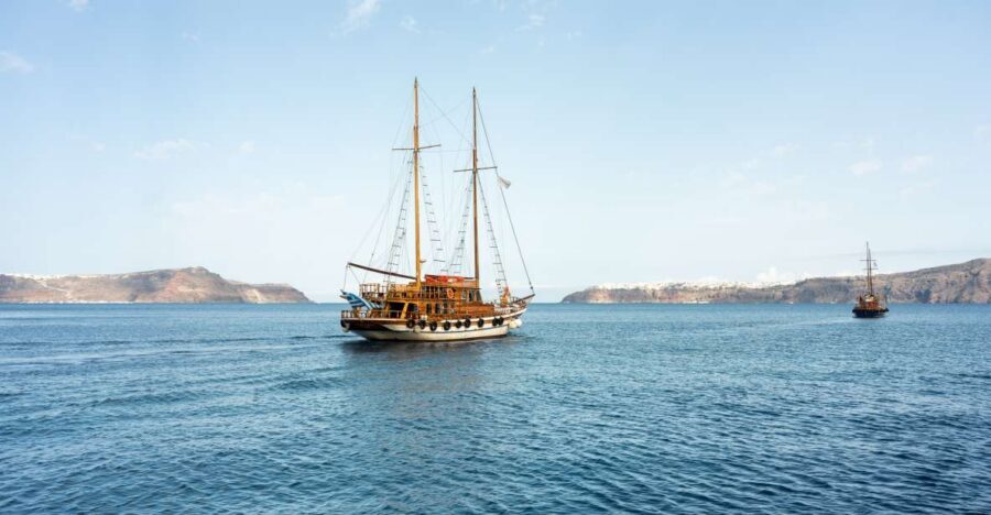 Santorini: Volcanic Islands Cruise with Hot Springs Visit - Caldera sailing views: Santorini looks different from sea level