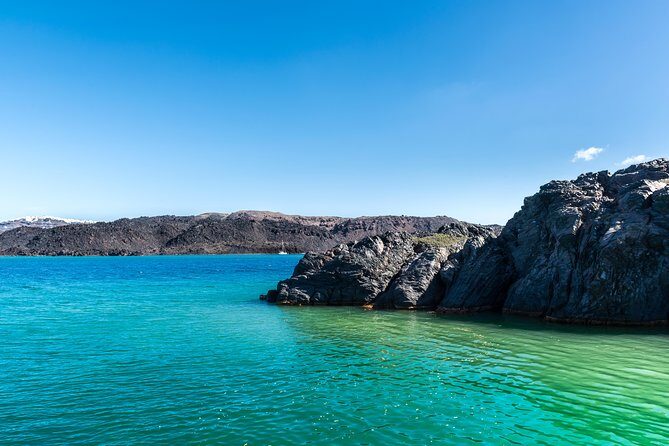 Santorini Volcano and Hot Springs Cruise Tour from Fira Old Port - Volcano Stop: Nea Kameni Hike, Summit Views, and the 5€ Entrance