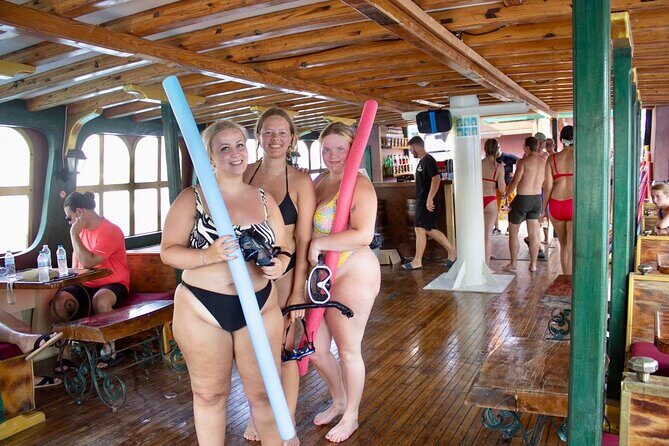 Sun & Sea 6 Hour All Inclusive Swimming Cruise with Greek BBQ & Unlimited Drinks - Top Deck Bean Bags, Shade Options, and the Heat Reality