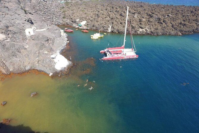 Sunset Sailing Catamaran Cruise in Santorini with BBQ and Drinks - The Ancient Lighthouse Stop: Sea-View History Without the Crowds