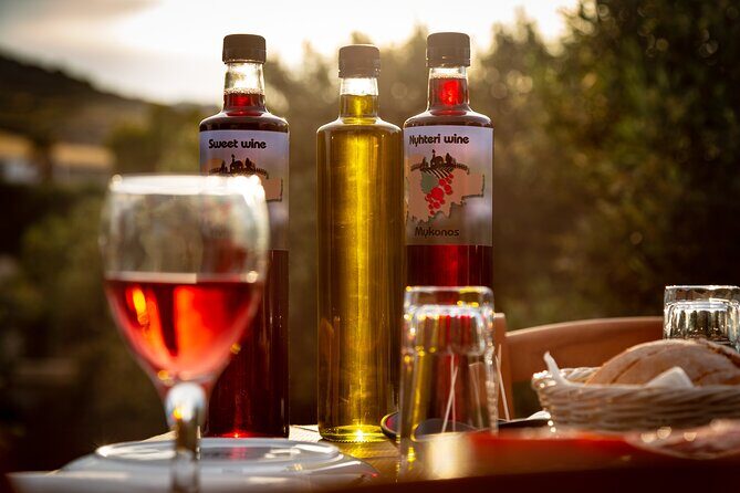 Tour and Wine Tasting in Mykonian Land - The Tasting: Two Bottles, Olive Oil, and Homemade Bites